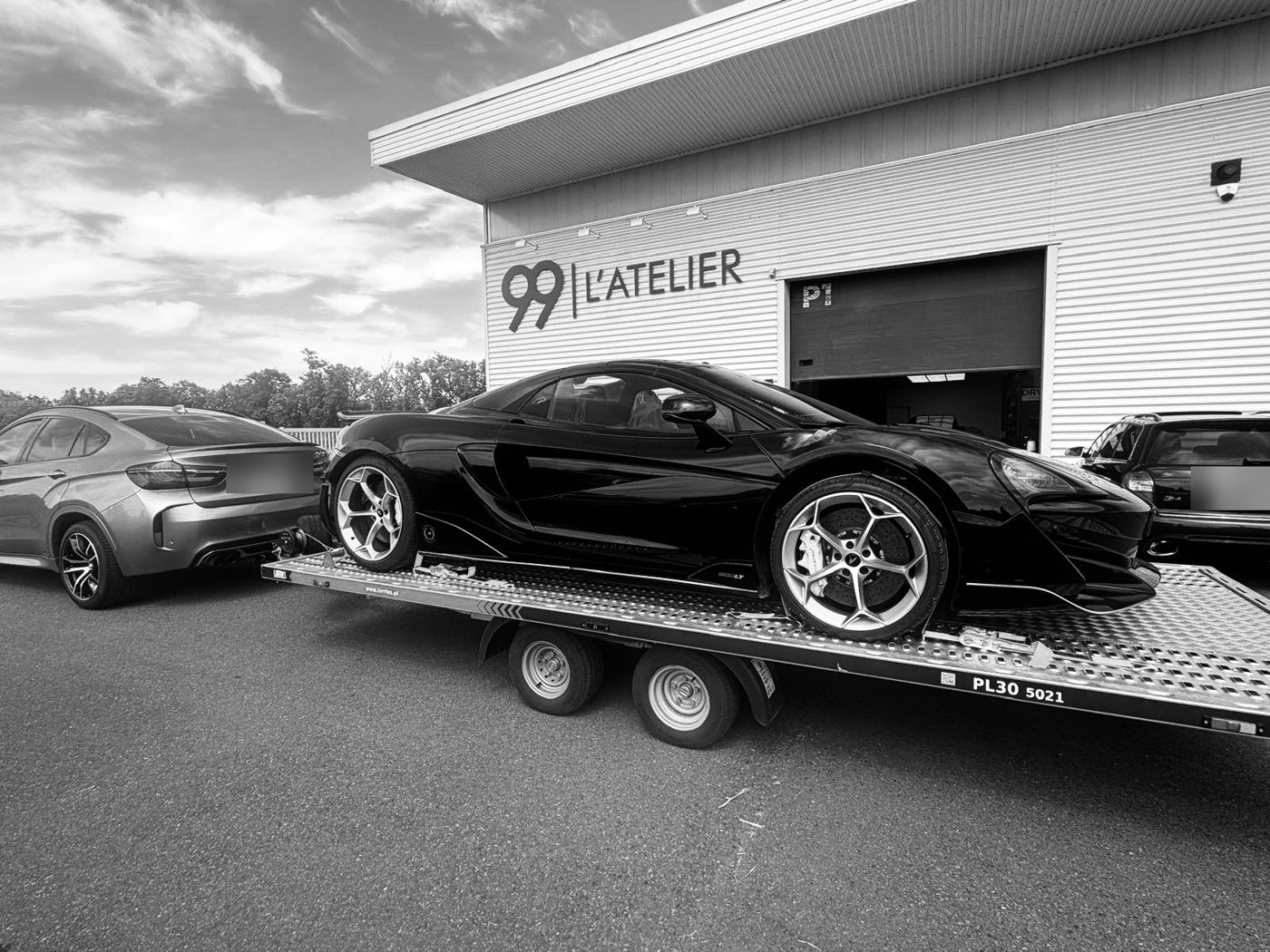 McLaren 600LT sur plateau — collecte et restitution à domicile 99 L'Atelier